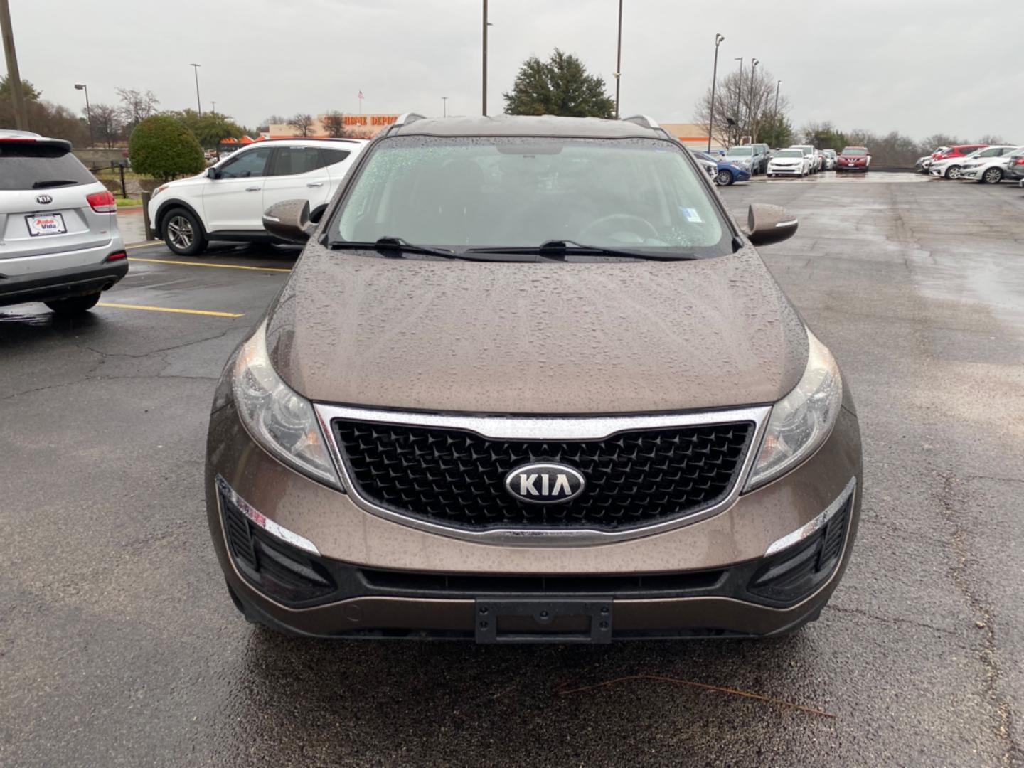 2015 TAN Kia Sportage LX FWD (KNDPB3AC2F7) with an 2.4L V6 DOHC 24V engine, 6-Speed Automatic transmission, located at 420 I-35E, Lancaster, TX, 75146, (469) 297-4144, 32.593929, -96.823685 - Photo#1